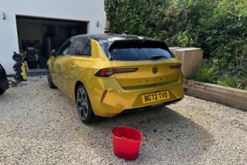 Gold-coloured Vauxhall Astra PHEV being washed