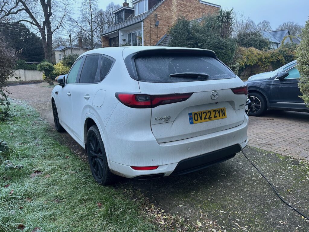 White Mazda CX60 PHEV rear frosted over