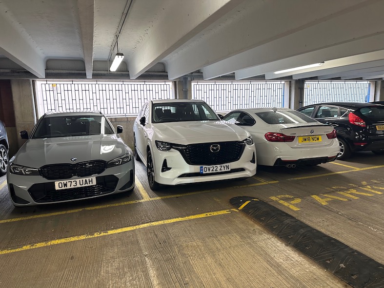 White Mazda CX60 PHEV front parked