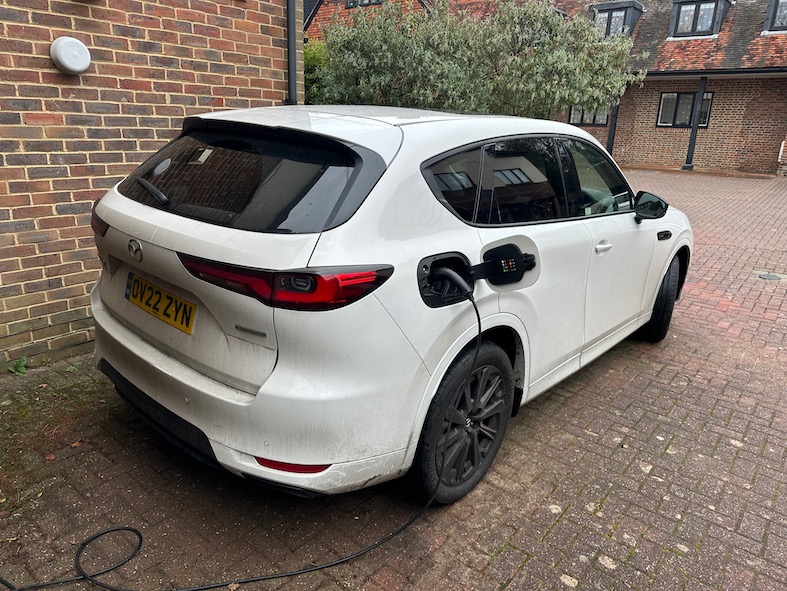 White Mazda CX60 PHEV charging