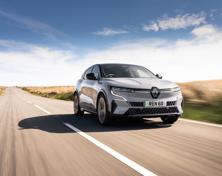 Grey Renault Megane E-Tech front driving