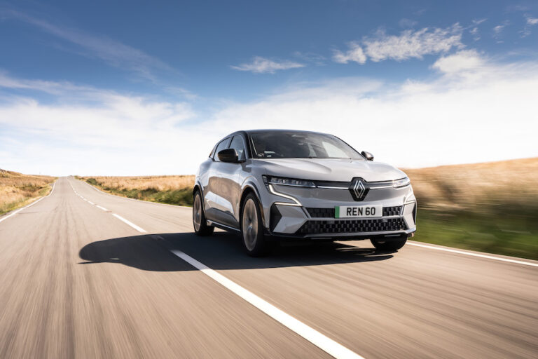 Grey Renault Megane E-Tech front driving