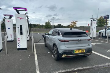 Grey Renault Megane EV charging at Ionity