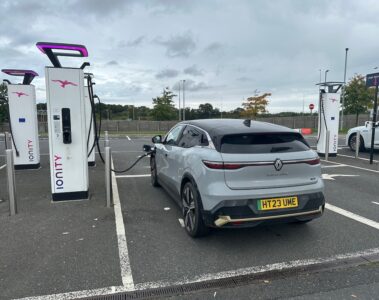 Grey Renault Megane EV charging at Ionity