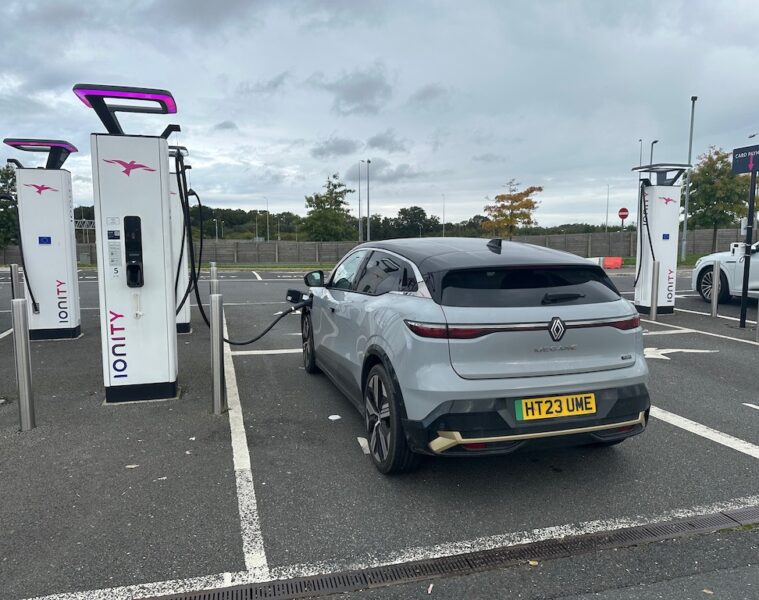 Grey Renault Megane EV charging at Ionity