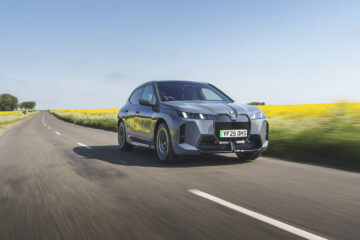 BMW iX front three-quarters driving