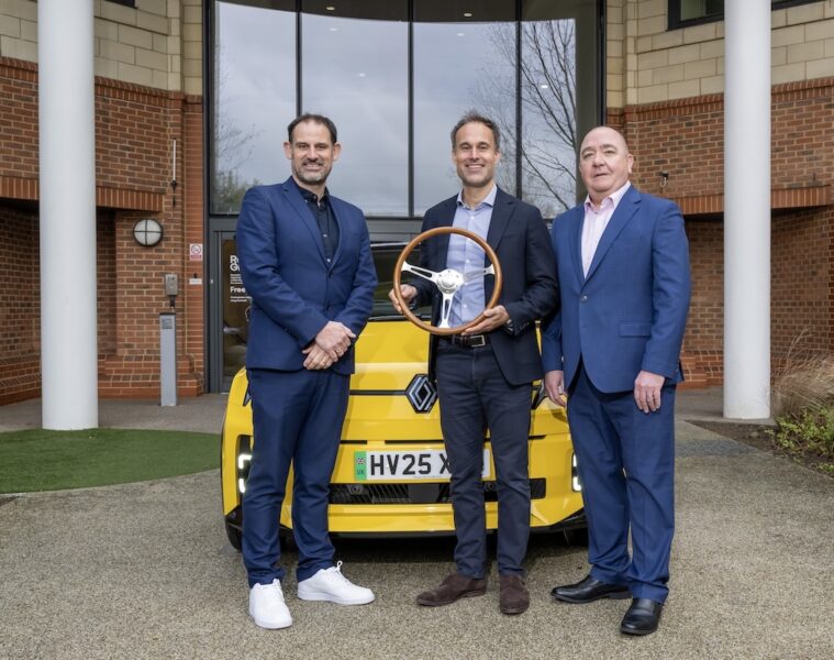 John Challen hands over 2026 UK Car of the Year award to Adam Wood for Renault 5 winner