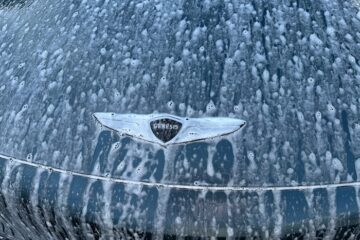Genesis Gv60 badge in car wash